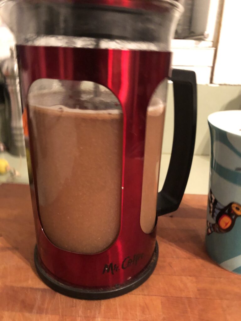 Dandelion coffee drink in a french press